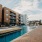 a swimming pool surrounded by buildings