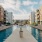 a swimming pool surrounded by buildings