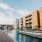 a swimming pool surrounded by buildings