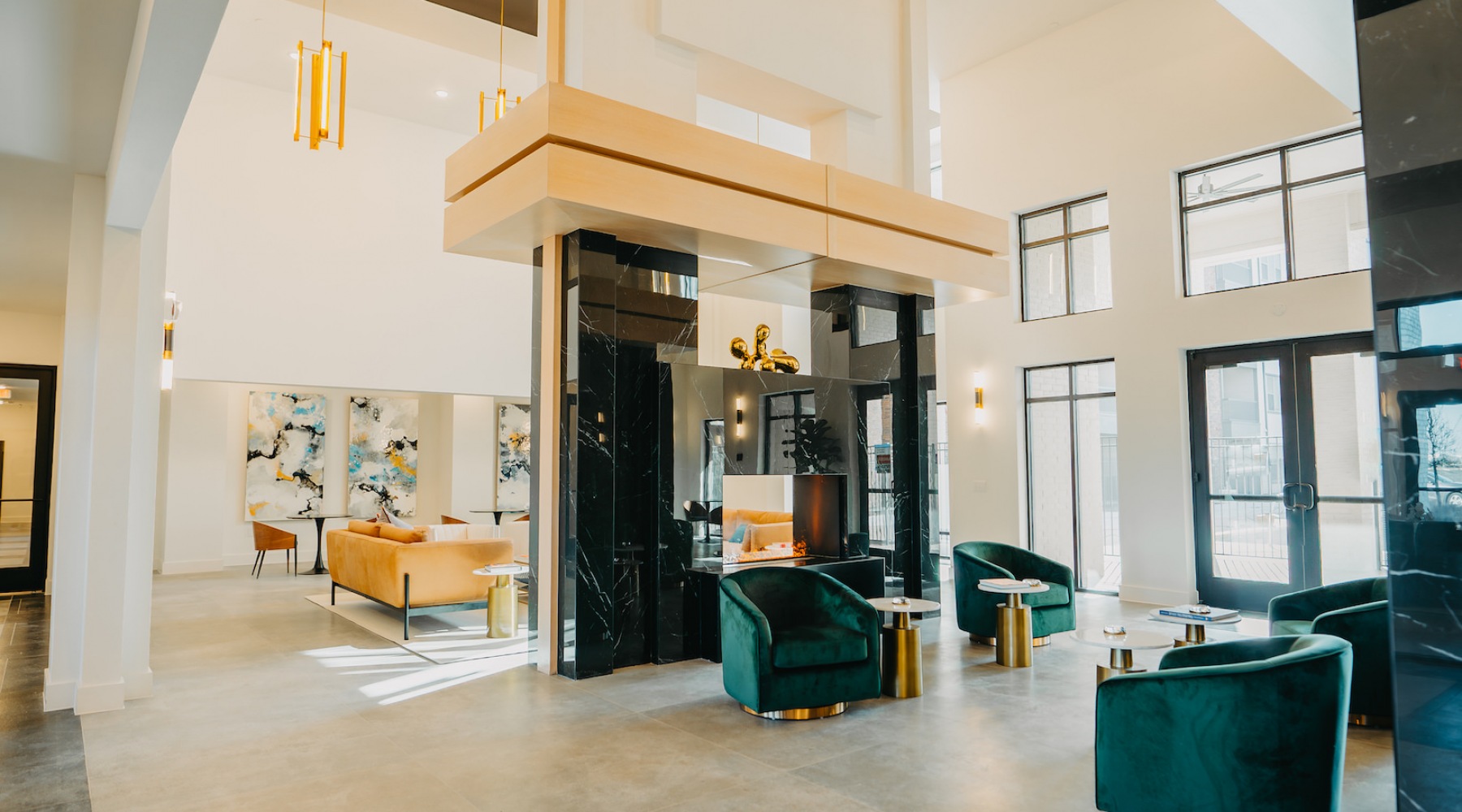 a clubhouse with chairs and couches